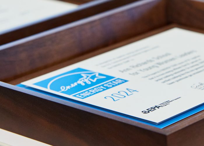 Closeup of an Energy Star award in a wooden frame