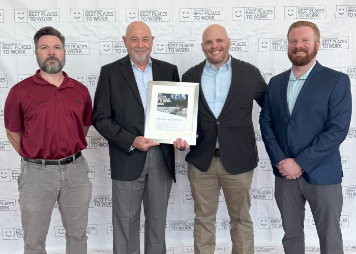 Performance Services' Arkansas Team accepting a Best Places to Work in Arkansas Award