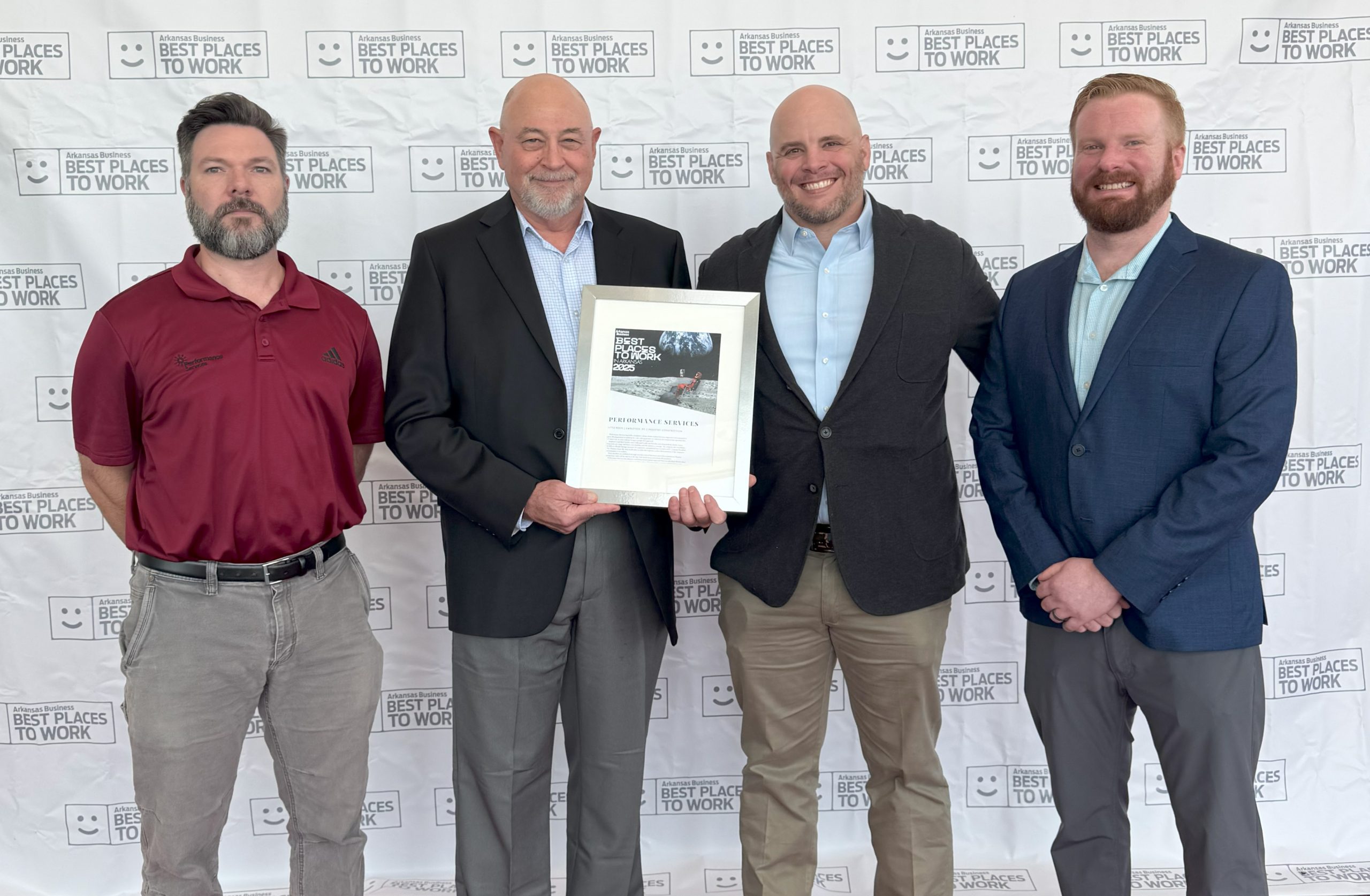 Performance Services' Arkansas Team accepting a Best Places to Work in Arkansas Award