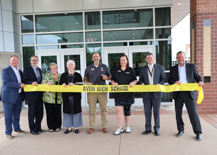 Avon Schools project team cutting ceremonial ribbon after completing High School renovation and expansion project