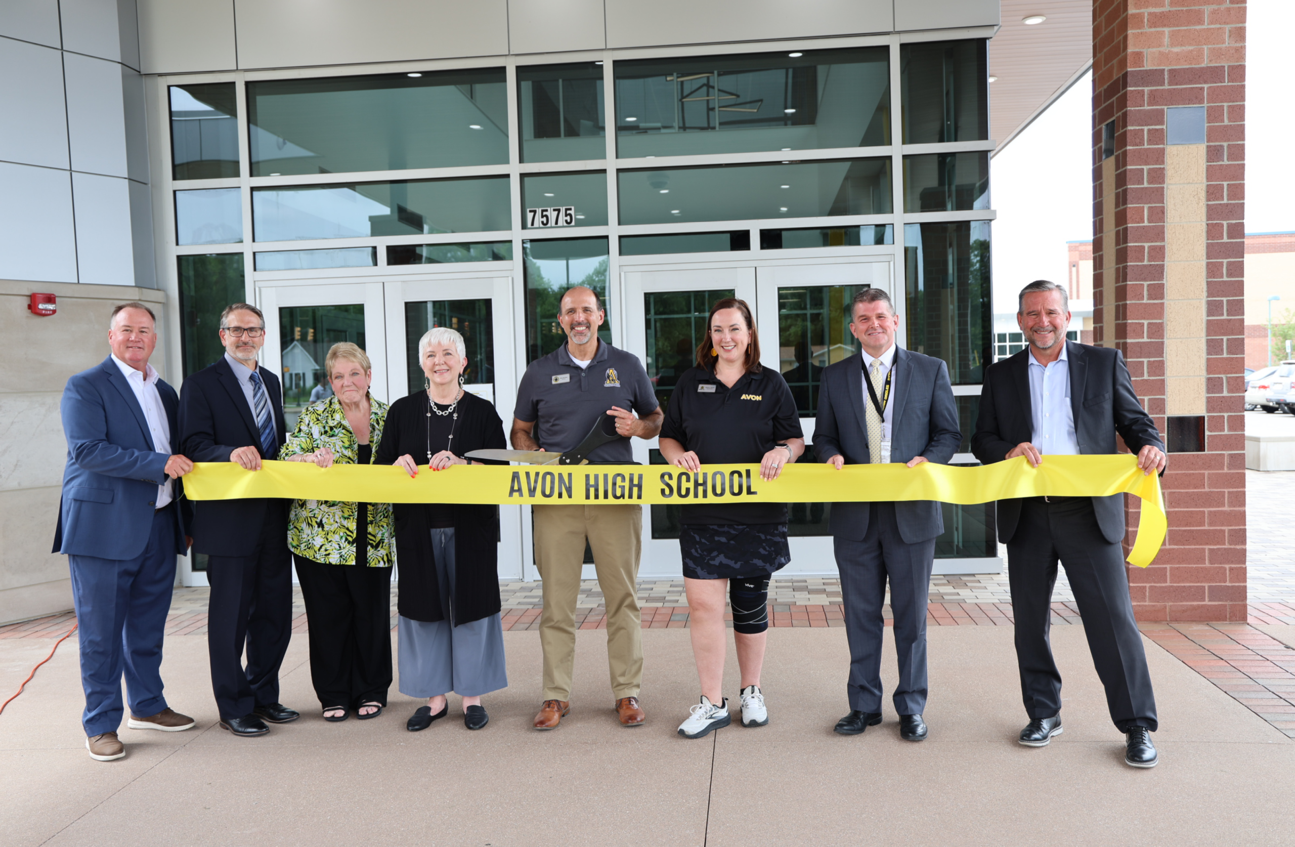 Avon Schools project team cutting ceremonial ribbon after completing High School renovation and expansion project