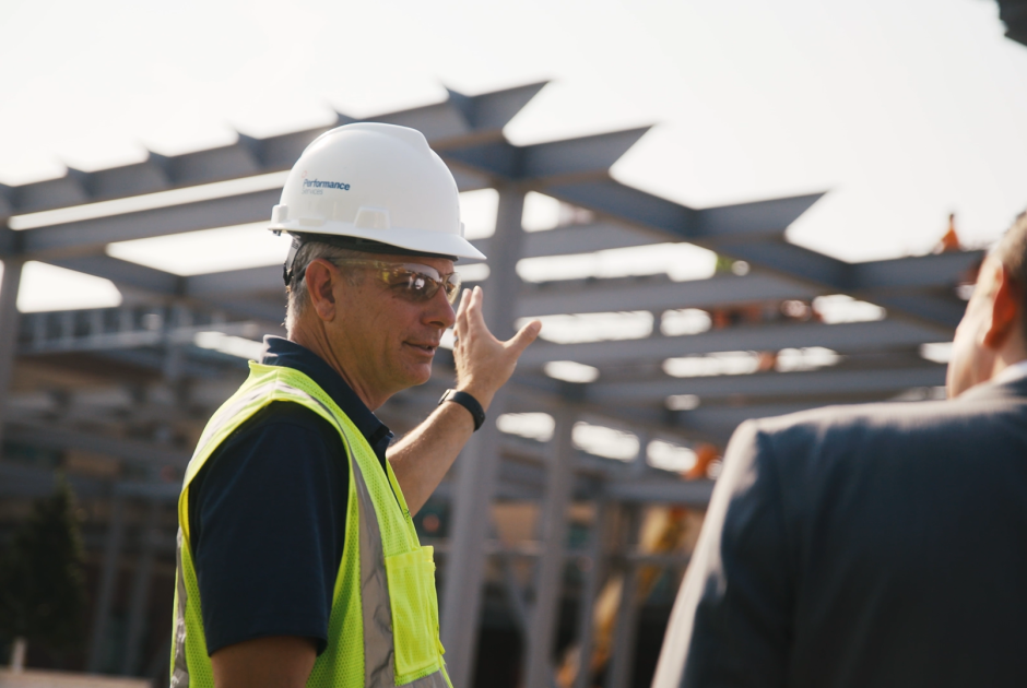 Performance Services team member in PPE on a construction site