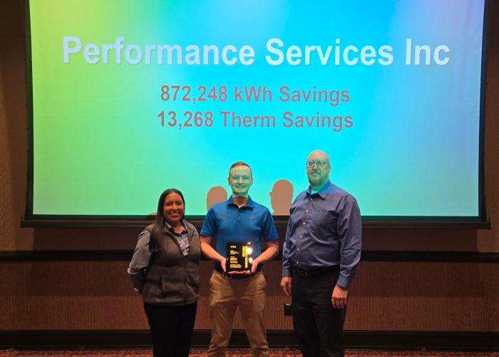 Performance Services team members receiving the Outstanding General Contractor for 2025 award from TRC