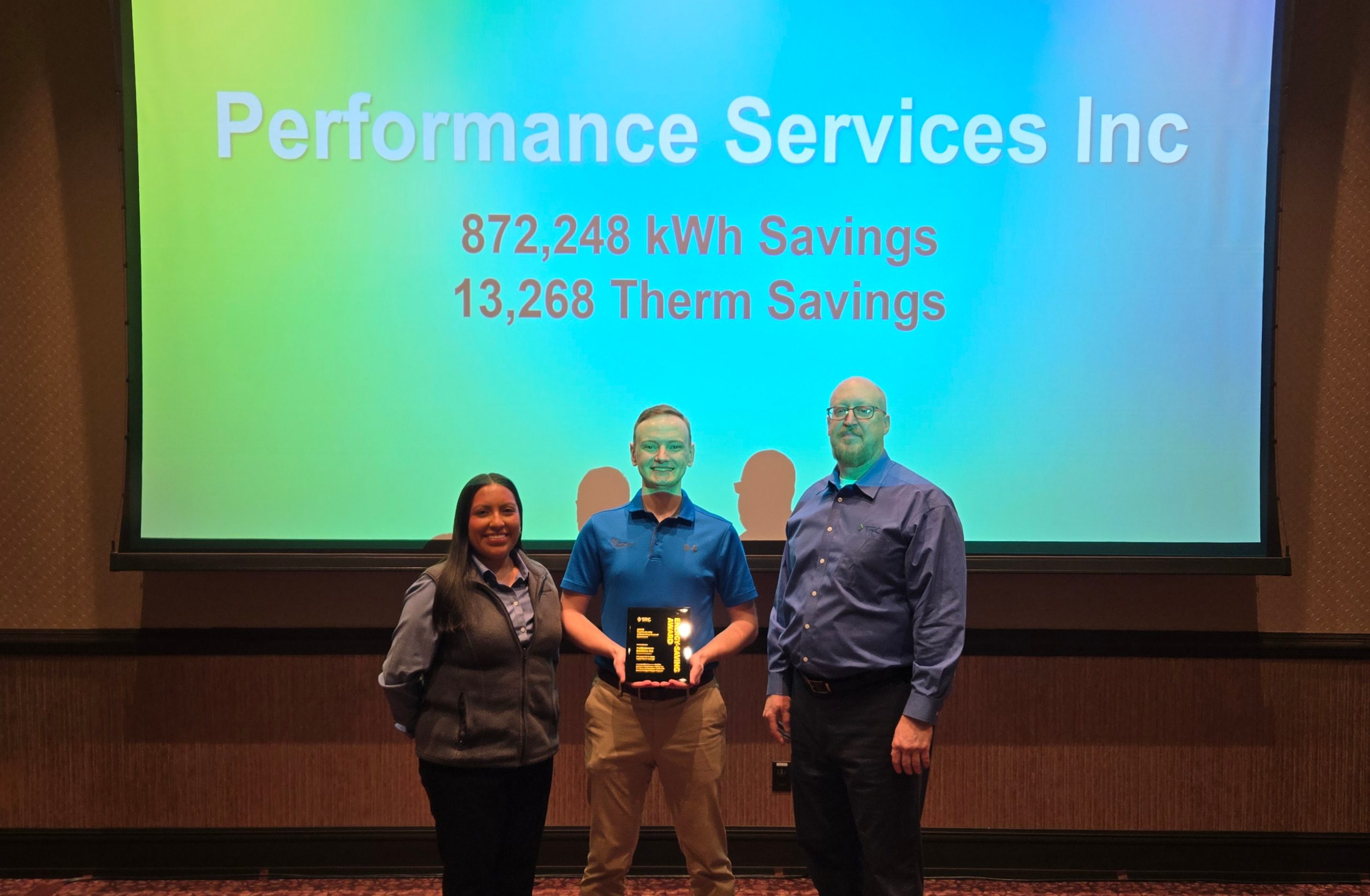 Performance Services team members receiving the Outstanding General Contractor for 2025 award from TRC