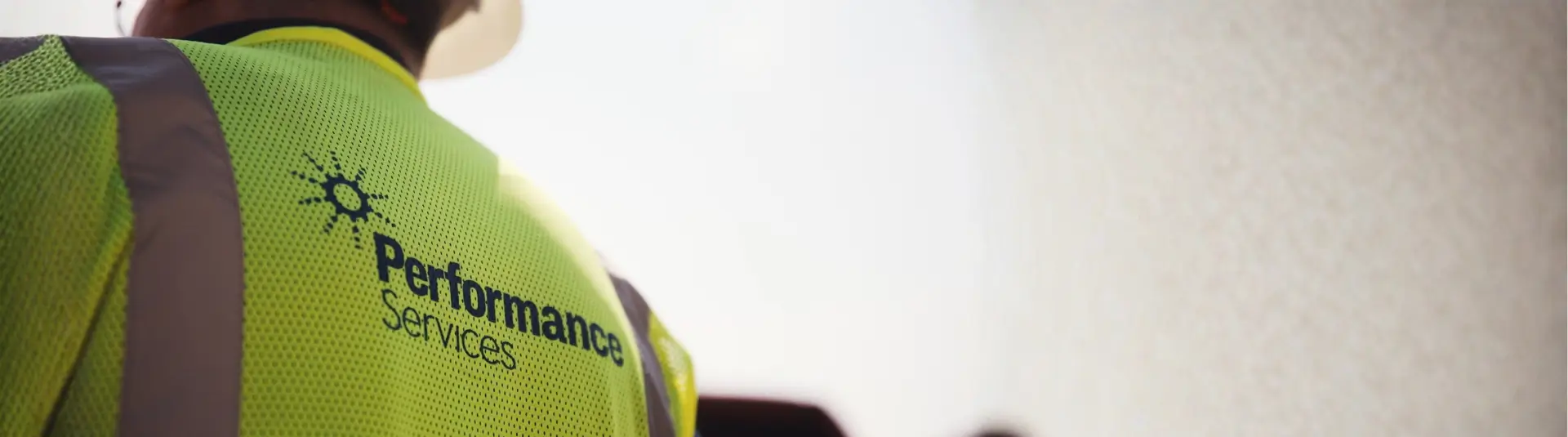 Performance Services employee wearing a safety vest